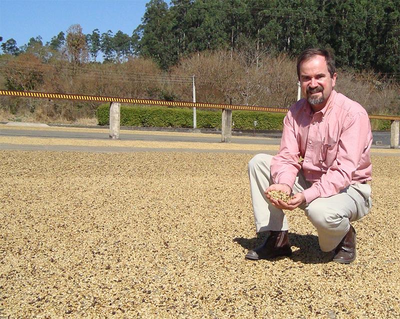 Gabriel de Carvalho Dias with his coffee at Fazenda Cachoeira da Grama in São Sebastião da Grama, Brazil