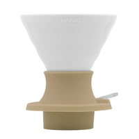 White Hario Switch V60 Ceramic Immersion Dripper - Jasmine White (Size 02) with beige base on a white background