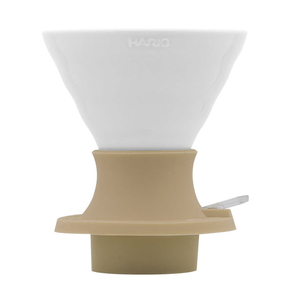 White Hario Switch V60 Ceramic Immersion Dripper - Jasmine White (Size 02) with beige base on a white background